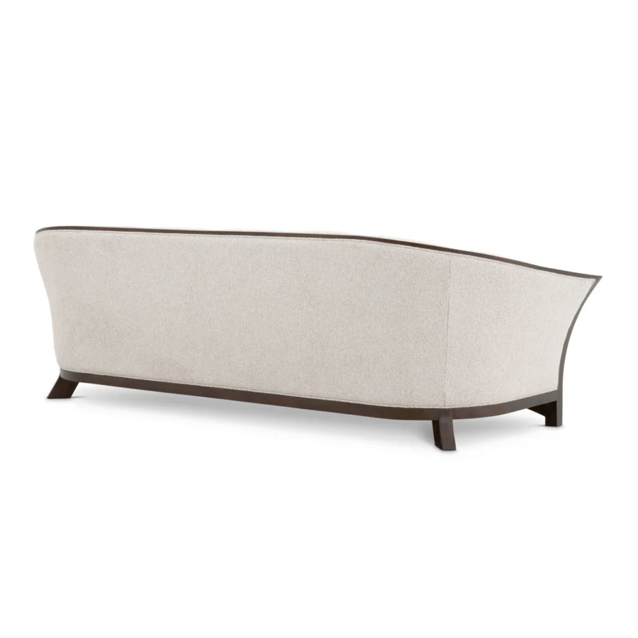 Sofa by Eichholtz Bleecker in Palmer Beige fabric, featuring an exposed mahogany-look frame and matte brown finish