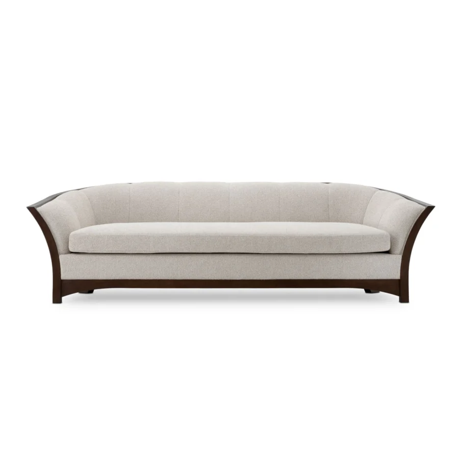 Sofa by Eichholtz in light grey textured upholstery with vertical channel tufting and mahogany look satin wood frame