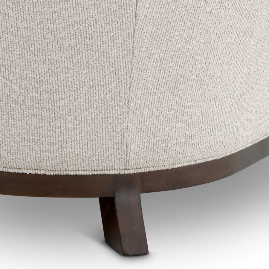 Sofa by Eichholtz in Palmer Beige upholstery featuring vertical seams, resting upon a dark brown wood base