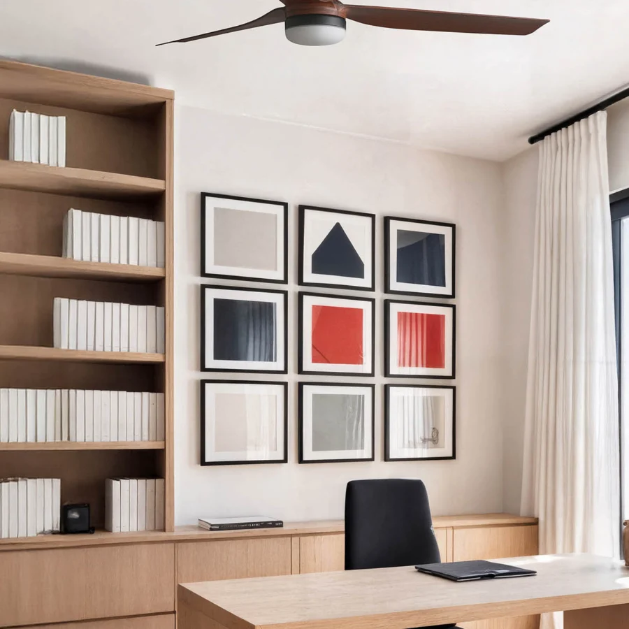 Ceiling fan by Faro Barcelona with matte black metal housing and medium-brown wood blades plus translucent LED fixture