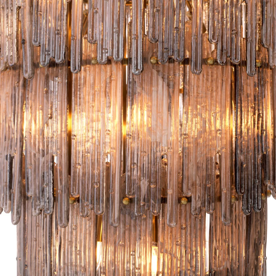 Chandelier by Eichholtz with brushed brass frame and six cascading tiers of textured smoked glass in cylindrical form