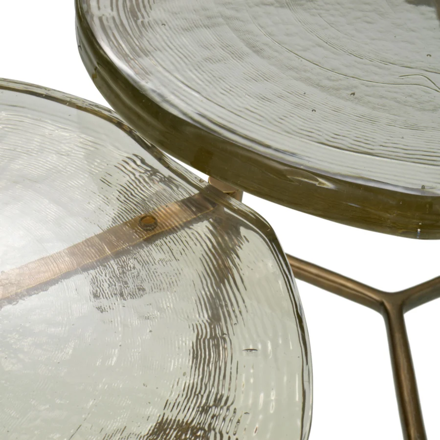 Coffee table set by Eichholtz with pale green textured glass tops and interconnected vintage brass finish metal supports
