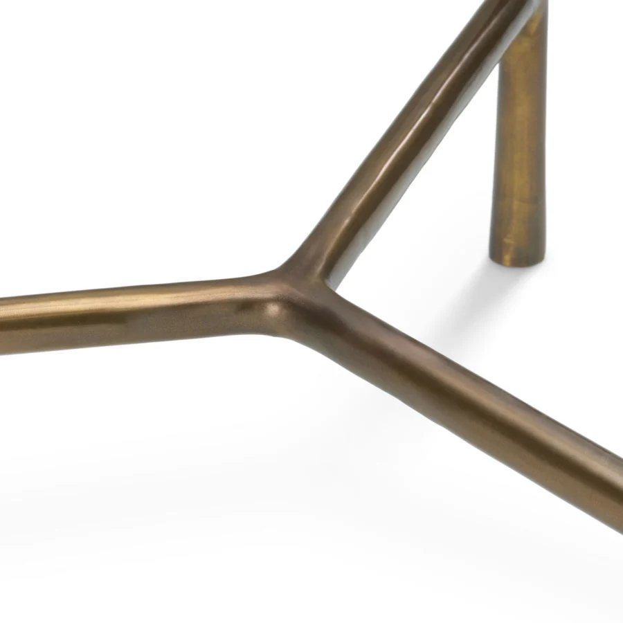 Coffee table set by Eichholtz with glass tops supported by Y-shaped metal frames in a warm vintage brass metallic finish