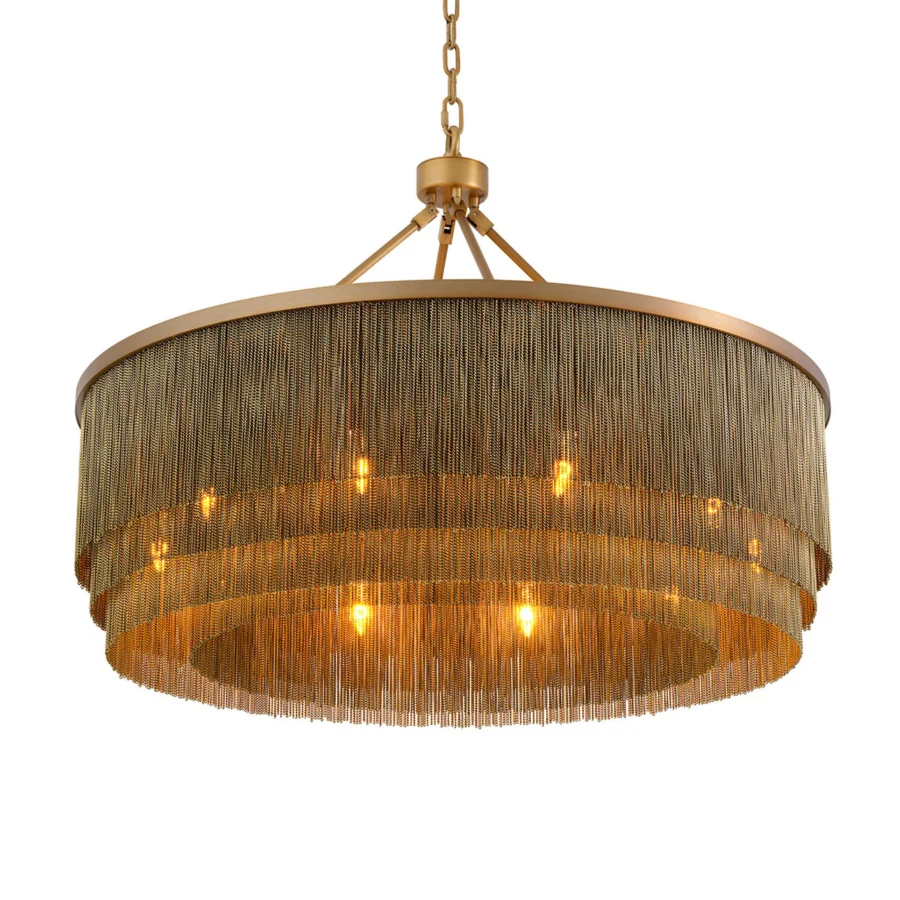 Suspension lamp by Eichholtz Tissot L in metal chains with antique brass finish and a three tier cascading fringe structure