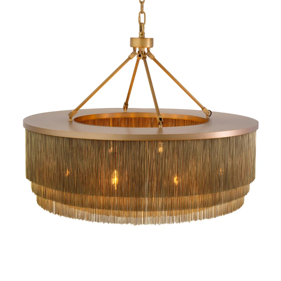 Suspension lamp by Eichholtz featuring a circular drum constructed from metal chains with antique brass finish and cascading fringe