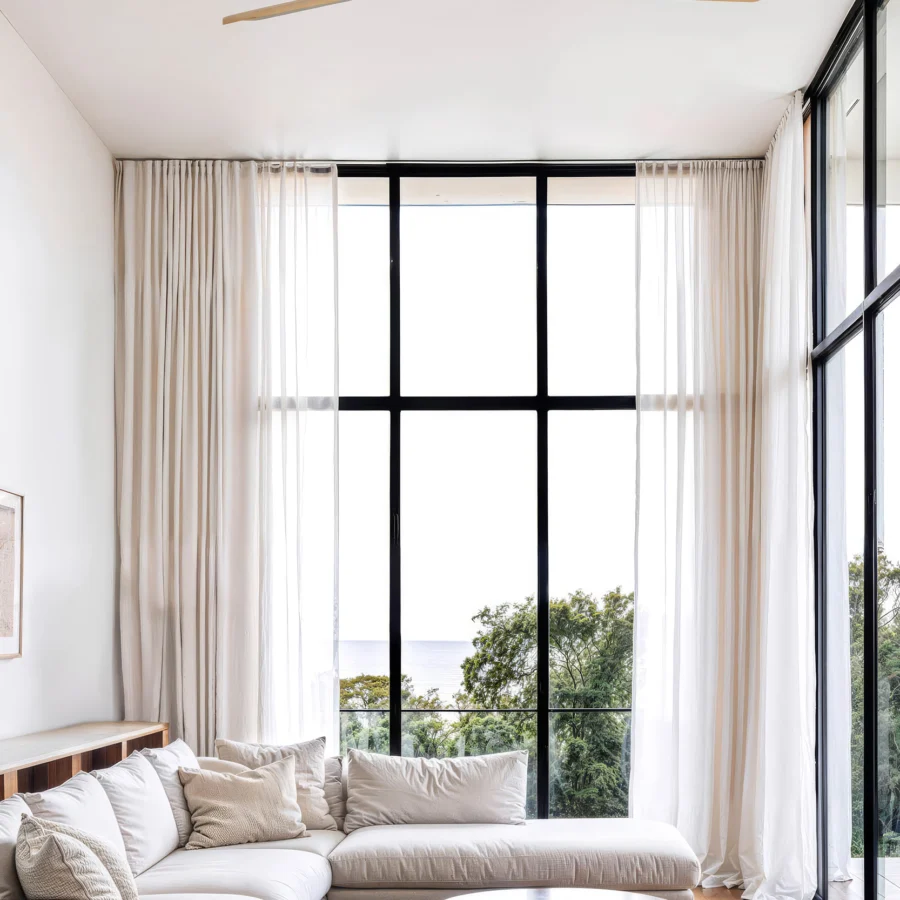 Ceiling fan by Faro Barcelona with pine wood blades and matte white motor housing, built in a minimalist low-profile form