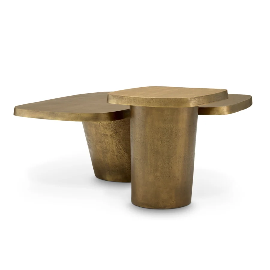 Coffee table set by Eichholtz in metal with a matte burnished brass finish featuring asymmetrical organic silhouettes and flared pedestal…
