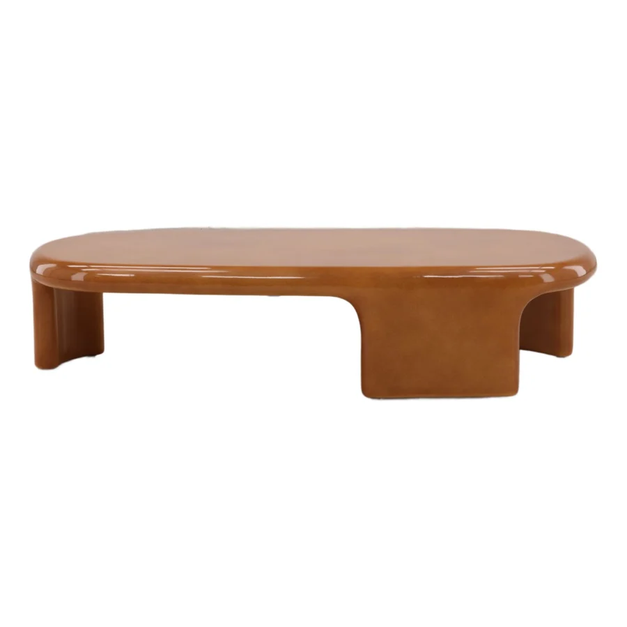 Coffee table by Dovetail in medium brown concrete with a smooth high gloss finish and integrated slab legs