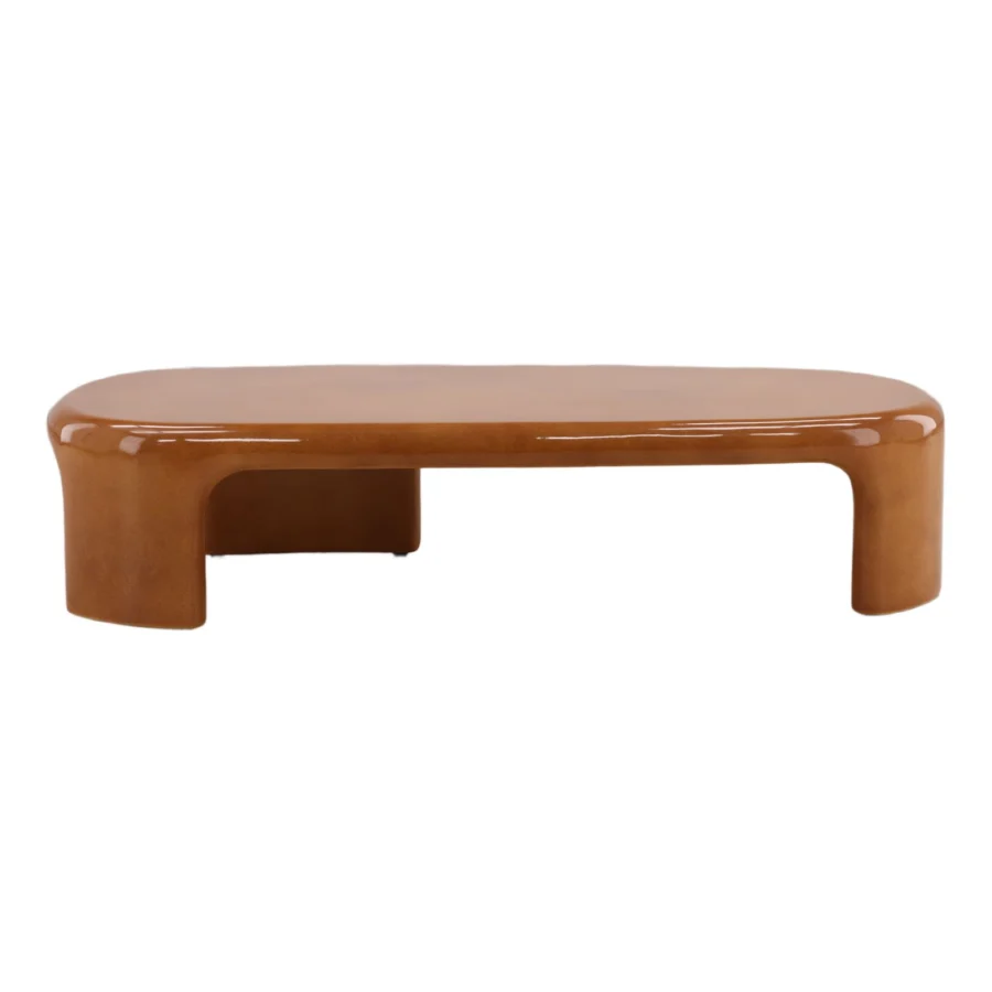 Coffee table by Dovetail in warm medium brown concrete with a high gloss finish, featuring an elongated waterfall base