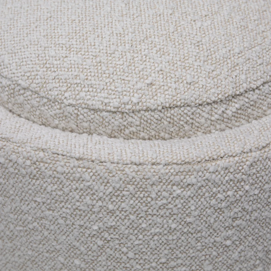 Bench by Dovetail in off-white boucle upholstery with a rounded silhouette plus horizontal channel detail throughout