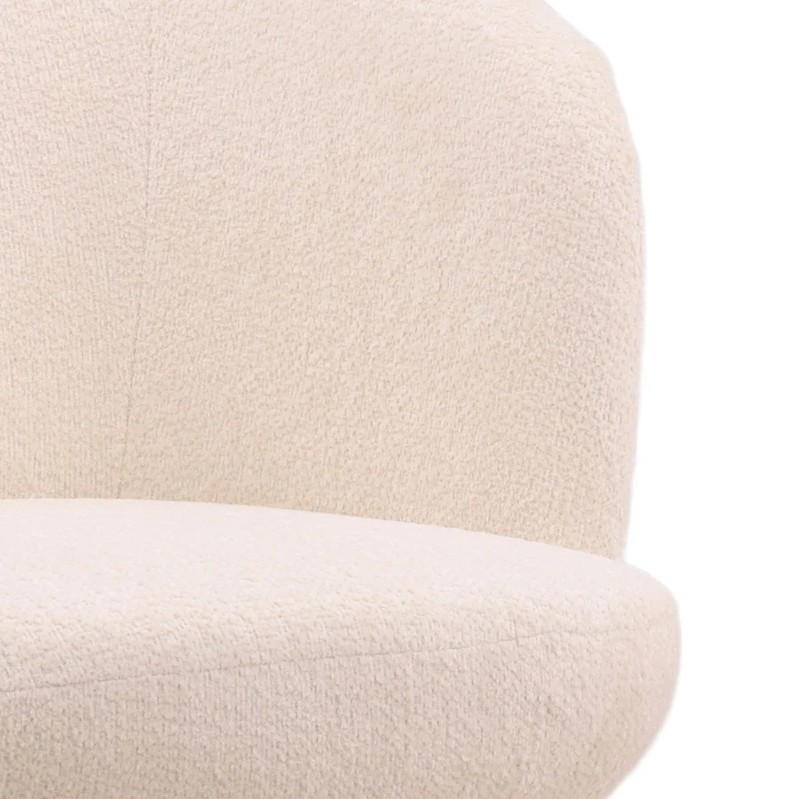 Dining chair by Dovetail Omaira in off-white looped performance fabric with central vertical seam and swivel base finish