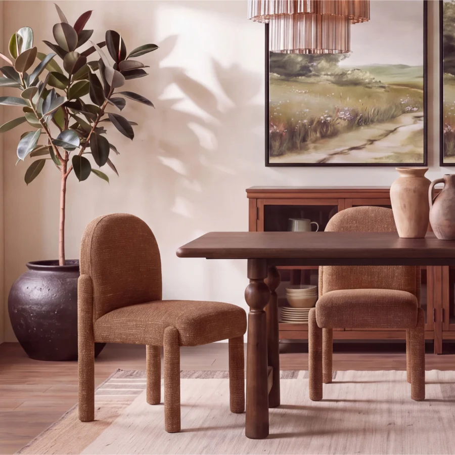 Dining chair by Dovetail in medium brown polyester acrylic linen fabric with matte finish, arched back and thick legs