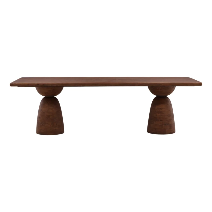 Dining table by Dovetail in mango wood with matte finish, showing rectangular top plus two geometric sculptural pedestals