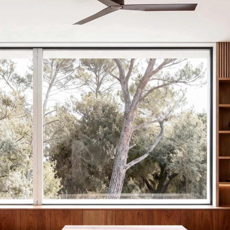 Ceiling fan by Faro Barcelona featuring three elongated metal blades finished in uniform matte charcoal