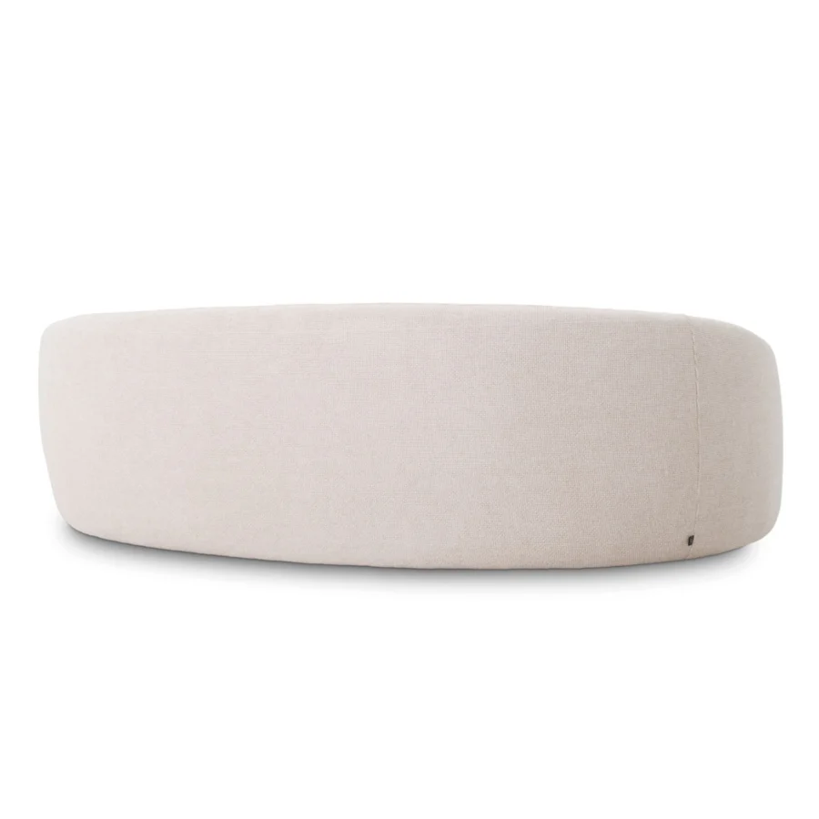 Sofa by Eichholtz in Lyssa off white fabric having curved silhouette resting on black base