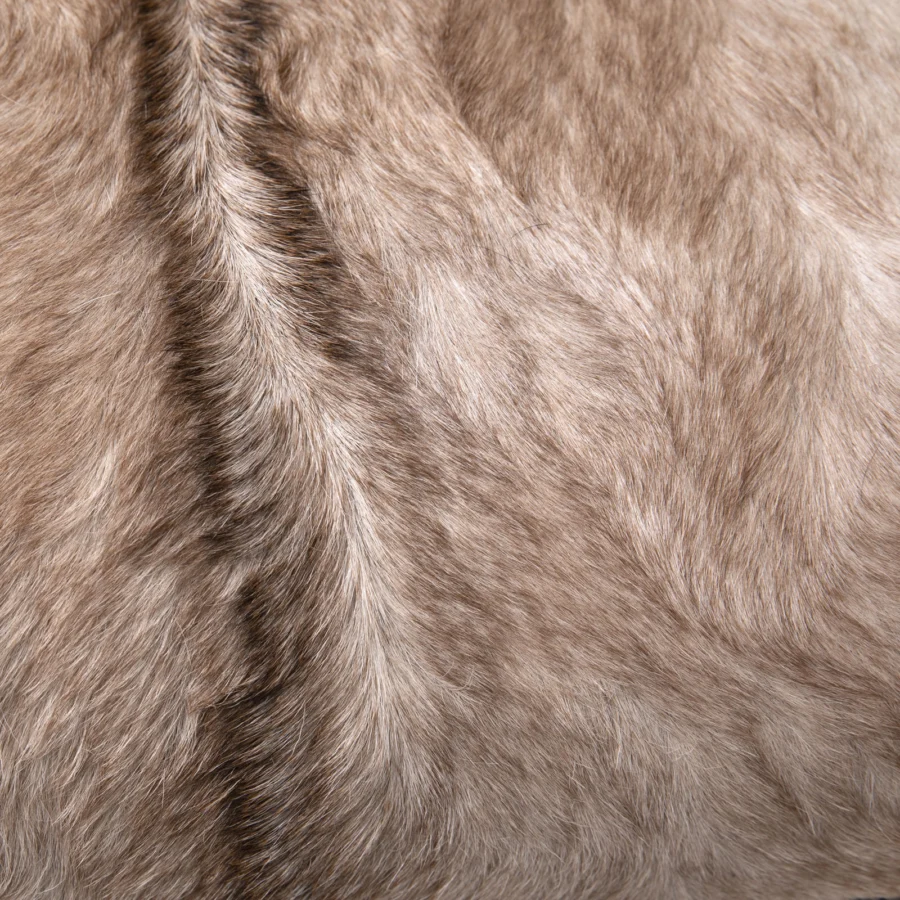Lounge chair by Dovetail in natural leather upholstery with hair-on-hide finish, featuring beige, brown and white stripes