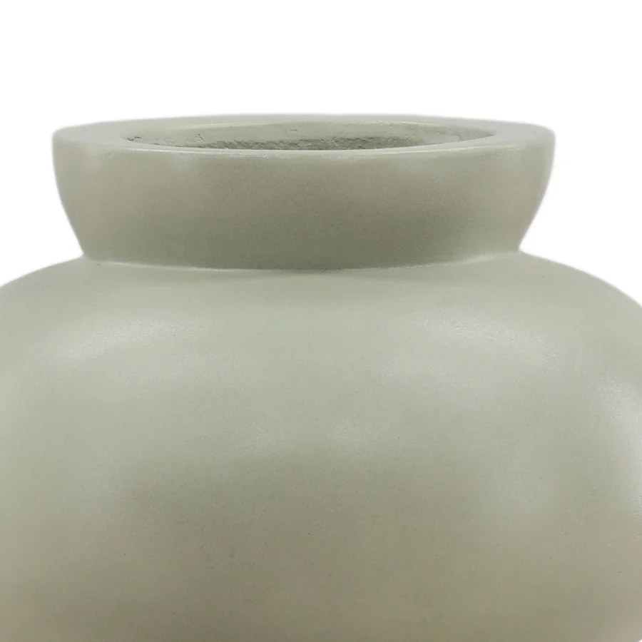 Vase by Dovetail in sage gray mineral material with matte finish and sculptural silhouette