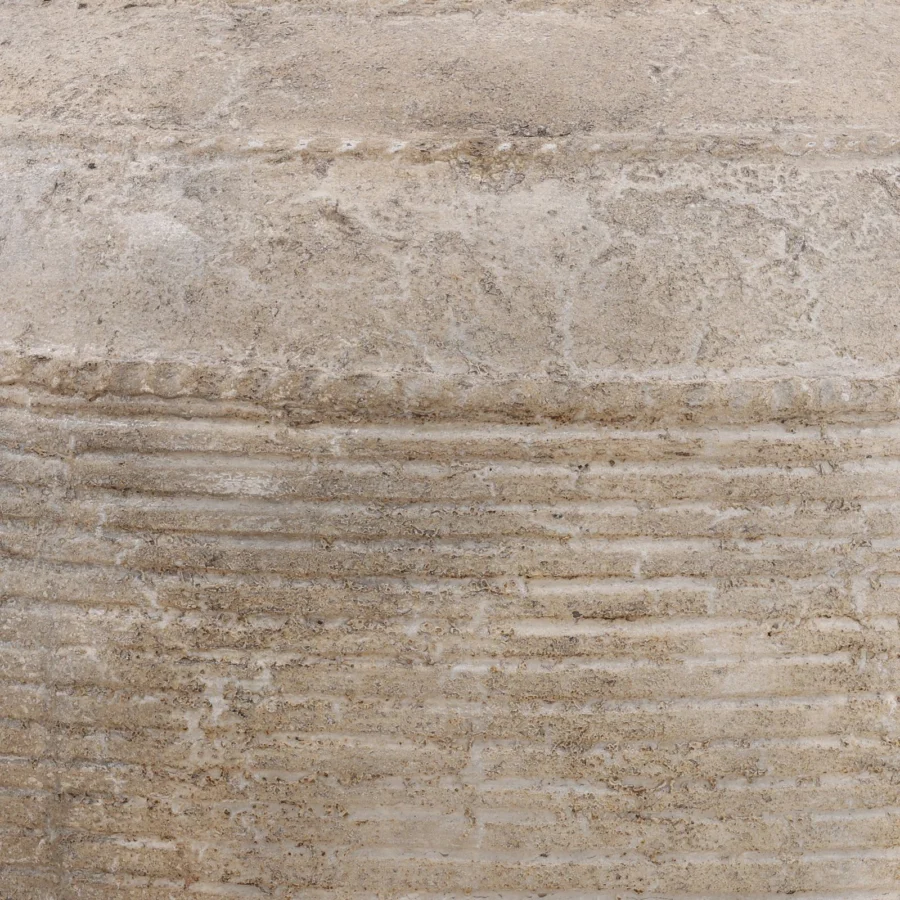 Pot by Dovetail in stone with rough weathered beige light taupe finish, displaying horizontal ribs and patterned raised band