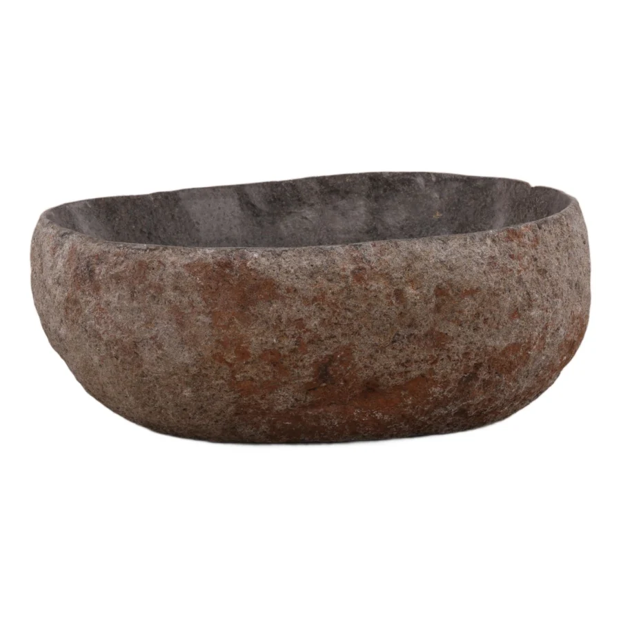 Bowl by Dovetail in carved stone with a rough earthy brown exterior, charcoal rust accents and smooth internal surface