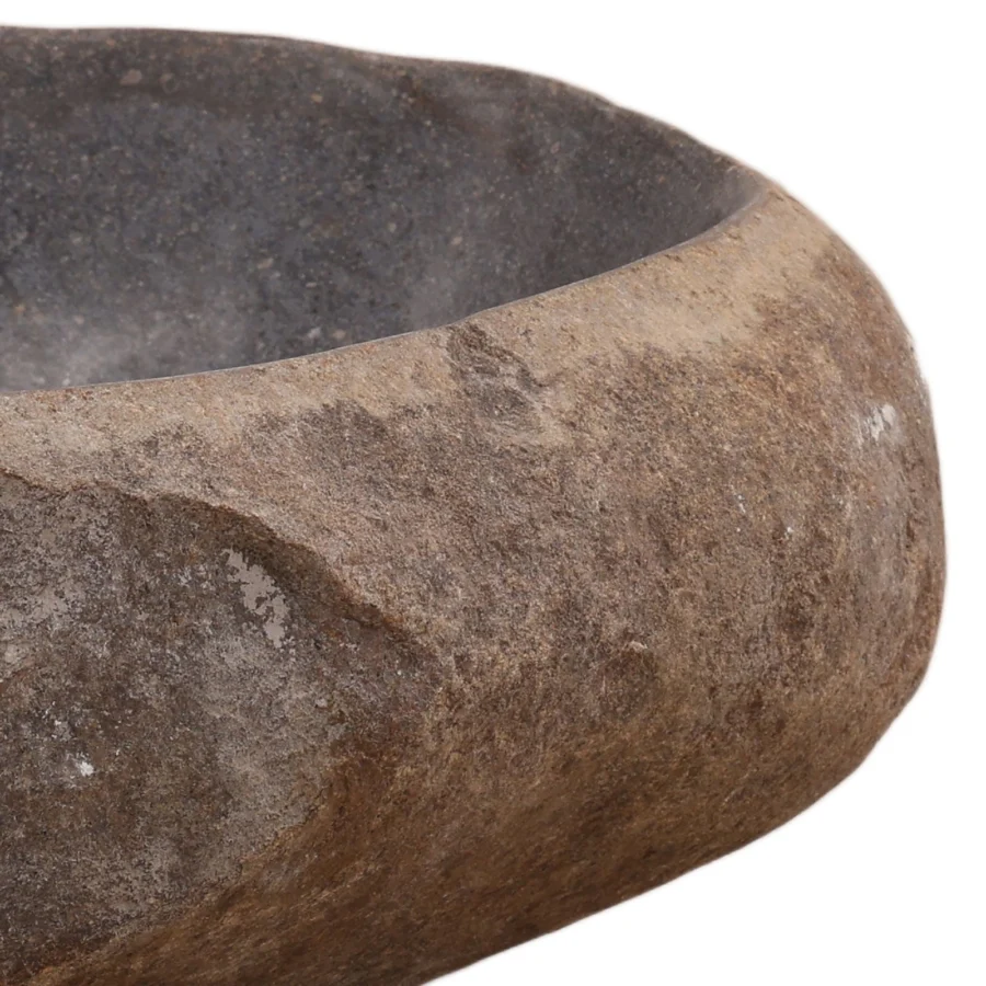Bowl by Dovetail in natural stone with coarse textured exterior and smooth concave interior in earthy brown gray charcoal