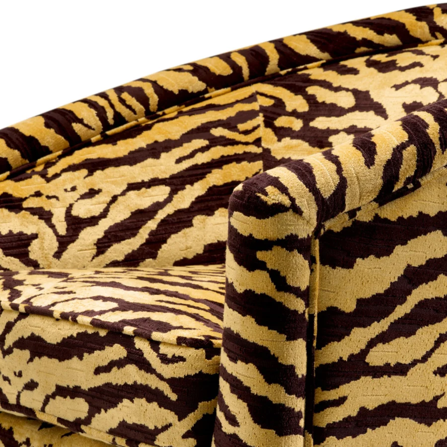 Lounge chair by Eichholtz in Tigris brown tiger-print fabric, featuring a brushed brass-finish swivel base and tub lines