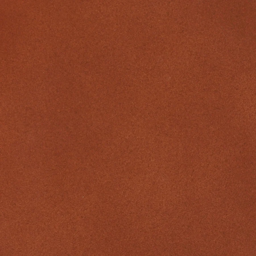 Side table by Dovetail Renwick in terracotta with a granular surface and a fine matte finish for outdoor seating areas