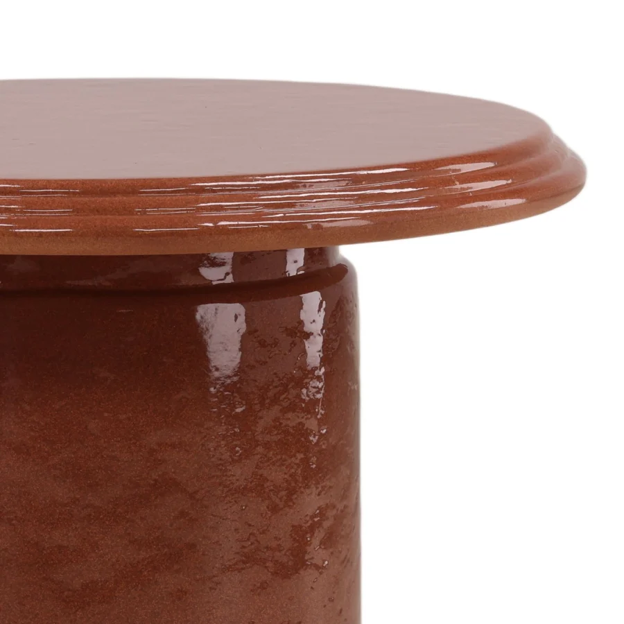 Side table by Dovetail Renwick in terra-cotta ceramic with glossy finish, featuring geometric pedestal and molded edge