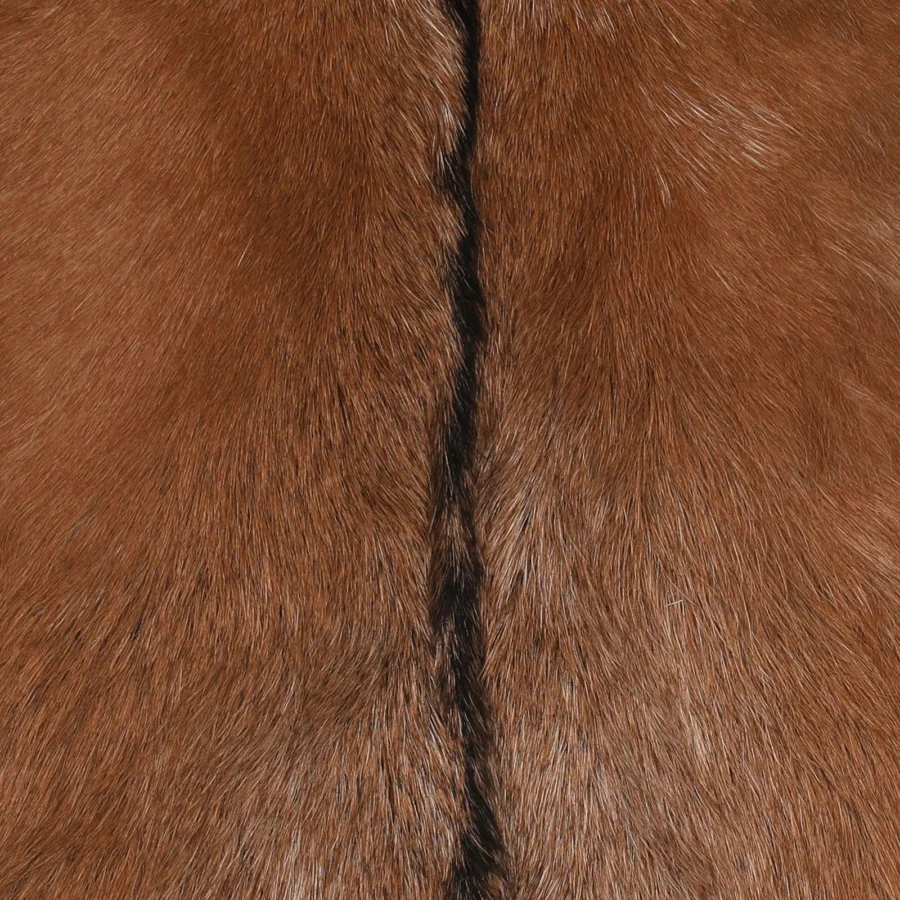 Lounge chair by Dovetail Newland in natural hide upholstery with multi-tonal brown fibers and a visible central seam