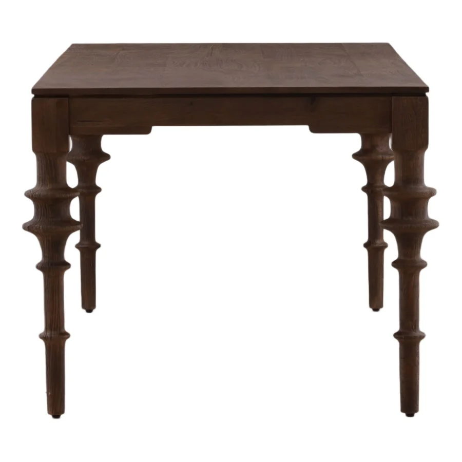 Table by Dovetail Savin in solid wood with dark brown matte finish, showing natural grain pattern and four turned legs