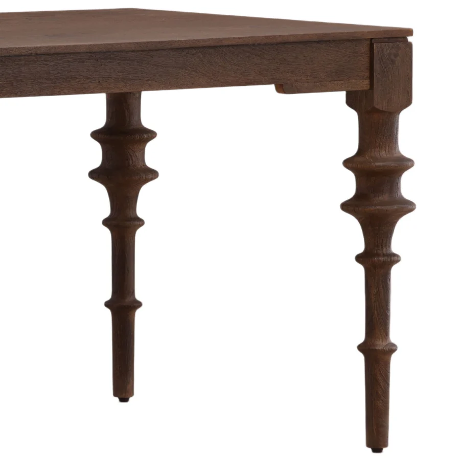 Table by Dovetail in dark brown wood with a rectangular top and turned legs featuring a matte textured finish